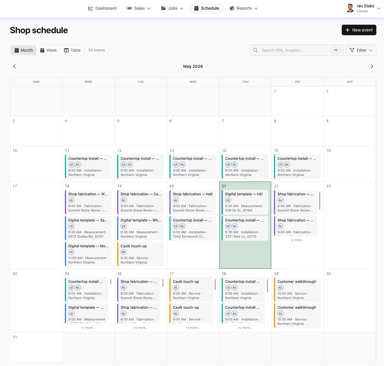 UpdatesPad job schedule calendar with template, fabrication, install, and service events